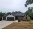 This MUST-SEE new construction home is located in the highly for sale in Pea Ridge Arkansas Benton County County on GolfHomes.com