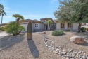 Live the AZ lifestyle in this beautiful light & bright Windrose for sale in Surprise Arizona Maricopa County County on GolfHomes.com