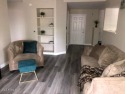 Beautiful REMODELED ground level condo with a GOLF CART PARKING for sale in Surprise Arizona Maricopa County County on GolfHomes.com