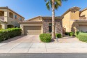 Featuring stone accents, desert landscape, a 2-car garage, gated for sale in Goodyear Arizona Maricopa County County on GolfHomes.com