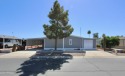 Awesome remodeled home with all new laminate flooring and carpet for sale in Florence Arizona Pinal County County on GolfHomes.com