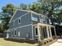 Less than 3/4 mile from downtown Fairhope, this two story for sale in Fairhope Alabama Baldwin County County on GolfHomes.com