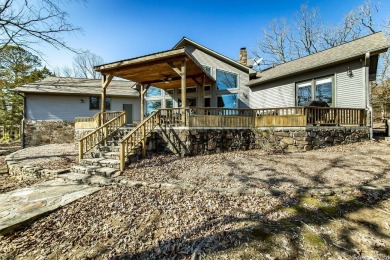Lakefront Home w/boat slip & lift behind the house.  This is the on Mountain Ranch Golf Club in Arkansas - for sale on GolfHomes.com, golf home, golf lot