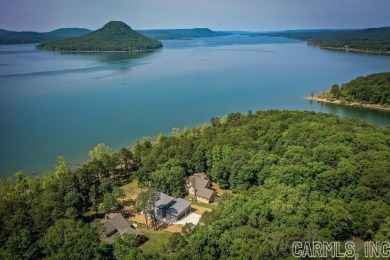 Situated on the shores Greers Ferry Lake, this home showcases on Indian Hills Country Club in Arkansas - for sale on GolfHomes.com, golf home, golf lot