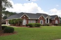 Beautiful, custom home in Tartan Pines situated on a corner lot for sale in Enterprise Alabama Coffee County County on GolfHomes.com