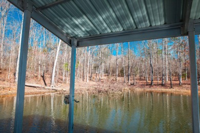 Lakefront home situated on half an acre & located on the south on Rocky Branch Golf Club in Georgia - for sale on GolfHomes.com, golf home, golf lot