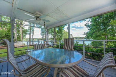 1980 contemporary styled Jackson Lake home with covered dock on Turtle Cove Golf Course in Georgia - for sale on GolfHomes.com, golf home, golf lot
