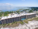 Welcome to Holiday Isle on Dauphin Island! Unit #208 is in for sale in Dauphin Island Alabama Mobile County County on GolfHomes.com