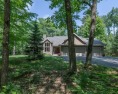 This stunning contemporary multi-level 4BR/4BA home in peaceful, Wisconsin