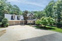 This Grove Hill home sits on a private lot with beautiful trees for sale in Auburn Alabama Lee County County on GolfHomes.com