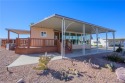 Turnkey and ready for you! Mountain Views, Huge Windows, all on for sale in Bullhead Arizona Mohave County County on GolfHomes.com